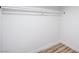 Walk-in closet featuring painted walls, baseboards, and a closet rod for ample storage at 3459 One Nation Ave, Las Vegas, NV 89121