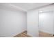 Walk-in closet featuring painted walls, baseboards, and a view to the entry door at 3459 One Nation Ave, Las Vegas, NV 89121