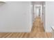 Hallway view with hardwood floors and white trim at 3459 One Nation Ave, Las Vegas, NV 89121