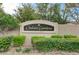 A community sign surrounded by manicured bushes and landscaping at 3618 Auckland Castle St, Las Vegas, NV 89135
