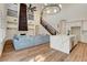 Open concept home featuring a kitchen island and great room with fireplace at 3618 Auckland Castle St, Las Vegas, NV 89135