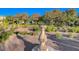 Intricate park sundial surrounded by a garden with lush greenery and trees at 3618 Auckland Castle St, Las Vegas, NV 89135