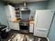 Well-equipped kitchen featuring modern appliances, custom cabinets, and ample counter space at 445 Sam Jonas Dr, Las Vegas, NV 89145