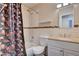 Bathroom features a shower-tub combo with a decorative shower curtain at 4693 Mill Valley Dr, Las Vegas, NV 89120