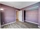 This bedroom features wood-look flooring and a standard closet at 4693 Mill Valley Dr, Las Vegas, NV 89120