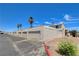 Row of garages with neutral siding, offering secure parking and curb appeal at 4693 Mill Valley Dr, Las Vegas, NV 89120