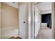 Hallway features an open door that leads to the main bedroom at 4693 Mill Valley Dr, Las Vegas, NV 89120