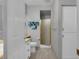 Clean bathroom with a shower, toilet and ample storage space at 471 Fallwood Ln, Las Vegas, NV 89107
