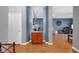 Inviting entryway with wood floors, a wood cabinet, and blue accent walls at 471 Fallwood Ln, Las Vegas, NV 89107