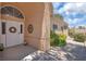 Inviting front entrance featuring a decorative door and charming accents at 471 Fallwood Ln, Las Vegas, NV 89107