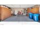 Spacious garage with built-in storage cabinets and ample room for vehicles at 471 Fallwood Ln, Las Vegas, NV 89107