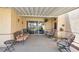 Covered patio with a variety of seating options and a view of the yard at 471 Fallwood Ln, Las Vegas, NV 89107
