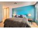 A bright bedroom showcasing a spacious layout, cozy decor, and natural light at 4718 Nara Vista Way # 104, Las Vegas, NV 89103