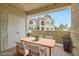 Relaxing outdoor patio with table and chairs at 4718 Nara Vista Way # 104, Las Vegas, NV 89103