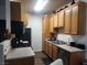 Functional kitchen featuring modern appliances and light wood cabinets at 4730 E Craig Rd # 1155, Las Vegas, NV 89115