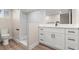 Modern bathroom with a sleek vanity, a glass-enclosed shower, and contemporary fixtures at 4805 Jay Ave, Las Vegas, NV 89130
