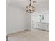 Bright dining area with modern light fixture and open view of the kitchen at 4805 Jay Ave, Las Vegas, NV 89130