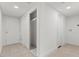 Hallway showing closet, tile floor and neutral paint at 4805 Jay Ave, Las Vegas, NV 89130