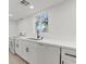 Bright kitchen showcasing sleek white cabinets, stainless appliances, and light countertops at 4805 Jay Ave, Las Vegas, NV 89130