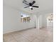 Open living room featuring neutral paint, tile floor, and lots of natural light at 4805 Jay Ave, Las Vegas, NV 89130