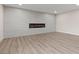 Spacious living room with fireplace and modern floors at 4805 Jay Ave, Las Vegas, NV 89130