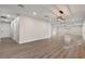 Large living room with modern floors, lighting, and fixtures at 4805 Jay Ave, Las Vegas, NV 89130