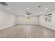 Expansive living room with recessed lighting and large windows providing natural light at 4805 Jay Ave, Las Vegas, NV 89130