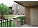 Relax on this balcony with metal railings and views of lush landscaping and a neighboring building at 5185 Indian River Dr # 223, Las Vegas, NV 89103