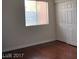 Bedroom offers a large window for natural light and a closet for storage at 5185 Indian River Dr # 223, Las Vegas, NV 89103