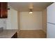 Bright dining area features tile flooring and a modern light fixture at 5185 Indian River Dr # 223, Las Vegas, NV 89103