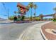 Community entrance with beautiful signage and landscaping at Bella Vita at 5185 Indian River Dr # 223, Las Vegas, NV 89103
