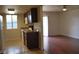 Open floor plan shows kitchen with living area and a sliding glass door at 5185 Indian River Dr # 223, Las Vegas, NV 89103