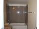 Shower features a standard shower head and updated shower surround at 5185 Indian River Dr # 223, Las Vegas, NV 89103