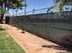A view of the tennis courts with mature trees at 5185 Indian River Dr # 223, Las Vegas, NV 89103