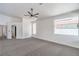 Spacious bedroom boasts neutral carpet and bright windows at 5321 Marietta Ave, Las Vegas, NV 89108