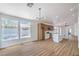 Open-concept kitchen with island, stainless steel appliances, and natural light at 5321 Marietta Ave, Las Vegas, NV 89108