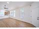 Open living room with plank floors, big windows, and modern touches at 5321 Marietta Ave, Las Vegas, NV 89108