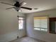 Bright bedroom with dual windows and neutral walls and flooring at 5334 Floating Flower Ave, Las Vegas, NV 89139