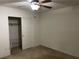 Bedroom with a ceiling fan, closet with an open door, and a basic layout, ready for personalization at 5334 Floating Flower Ave, Las Vegas, NV 89139