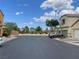 Street view showing the architecture, landscaping, and a gazebo in the neighborhood at 5334 Floating Flower Ave, Las Vegas, NV 89139