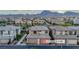 Stunning aerial view of the property, showcasing its prime location and neighborhood with mountain views at 541 Tokopah Falls St, Las Vegas, NV 89138
