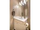 Bathroom features vanity with granite countertop, framed mirror, and storage at 541 Tokopah Falls St, Las Vegas, NV 89138