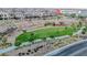Landscaped green space with walking path and seating area, near 541 Tokopah Falls Street at 541 Tokopah Falls St, Las Vegas, NV 89138