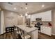 Modern kitchen features an island with granite countertops and stainless steel appliances at 541 Tokopah Falls St, Las Vegas, NV 89138