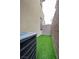Small side yard with artificial turf and privacy wall at 541 Tokopah Falls St, Las Vegas, NV 89138