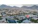 Street view of 541 Tokopah Falls Street showcasing the neighborhood homes and mountain backdrop at 541 Tokopah Falls St, Las Vegas, NV 89138