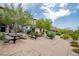 Community walking path and picnic tables with lush landscaping and mature trees at 541 Tokopah Falls St, Las Vegas, NV 89138