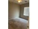 Inviting bedroom with neutral walls and carpet, with a window offering natural light at 6092 Fox Creek Ave, Las Vegas, NV 89122