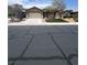 Charming single-story home featuring a well-maintained front yard with trees and a wide driveway at 6092 Fox Creek Ave, Las Vegas, NV 89122