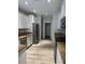 Galley kitchen with stainless steel appliances and granite countertops at 6092 Fox Creek Ave, Las Vegas, NV 89122